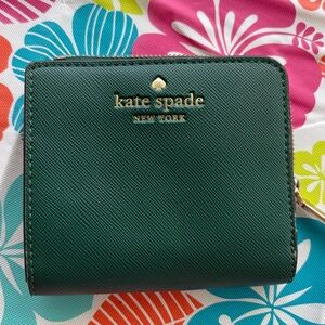 kate spade green saffiano zip wallet with gold logo
